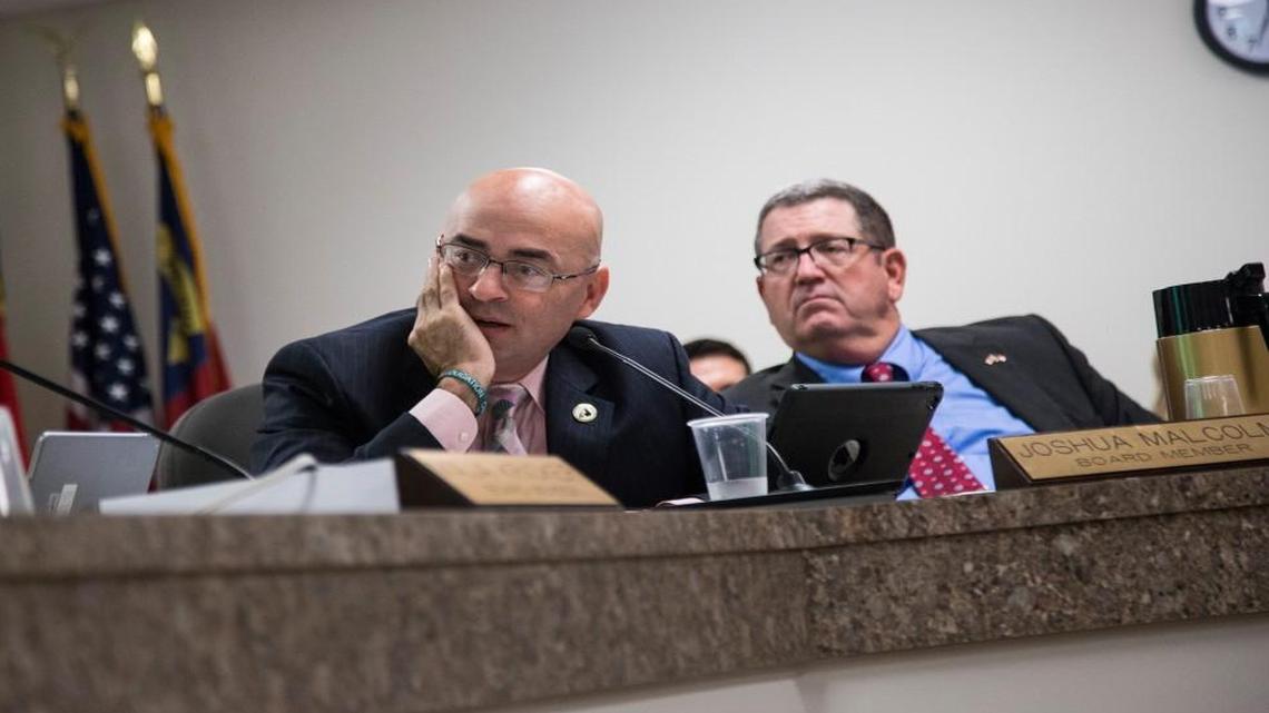 State Board of Elections members Joshua Malcolm, left, and A. Grant Whitney Jr. during a meeting Thursday, September 8, 2016 at the State Board of Elections in Raleigh.