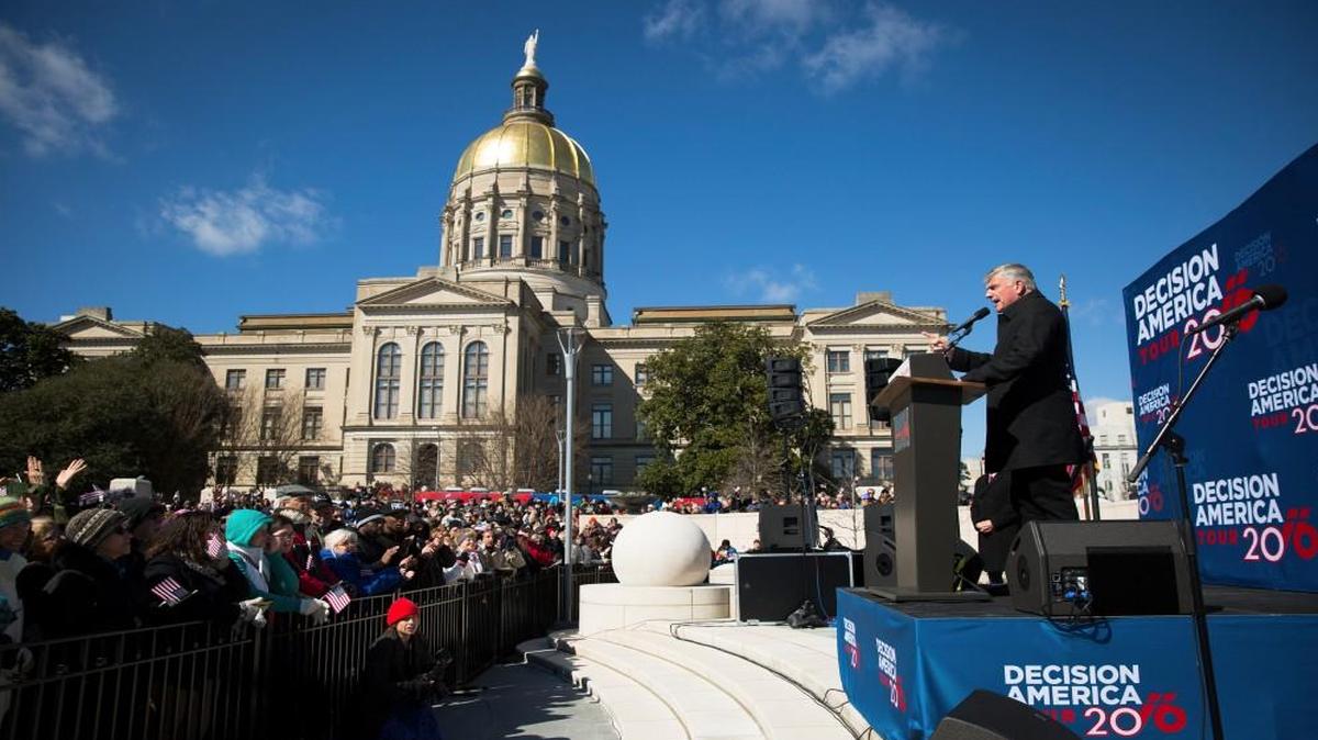 Franklin Graham, son of Billy Graham, speaks to a crowd outside the Georgia state capitol during a "Decision America" tour stop in Atlanta on Feb. 10. Graham, the son and successor of perhaps the nation’s most celebrated evangelist, has drawn attention for his scathing comments about Muslims, and is in the midst of what he calls a 50-state tour “to challenge Christians to live out their faith at home, in public and at the ballot box.”