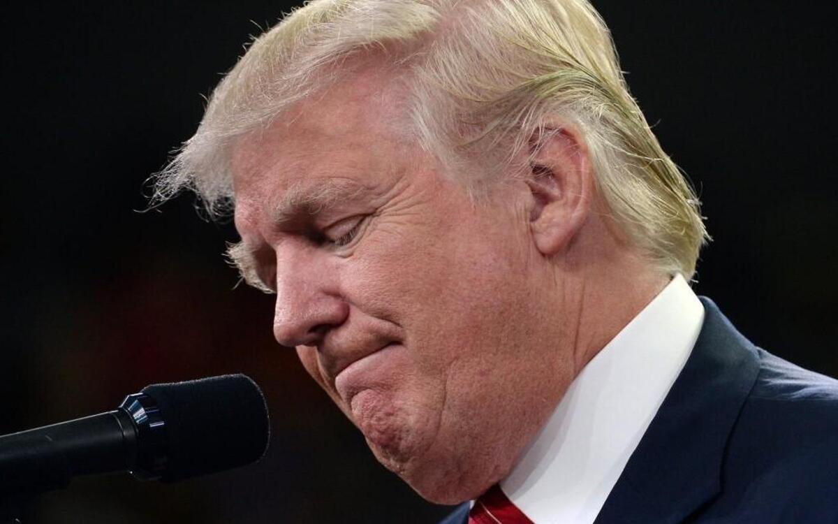 Republican presidential candidate Donald Trump grimaces as he makes remarks at the Trask Coliseum on the campus of UNC-W in Wilmington, N.C. August 9, 2016.