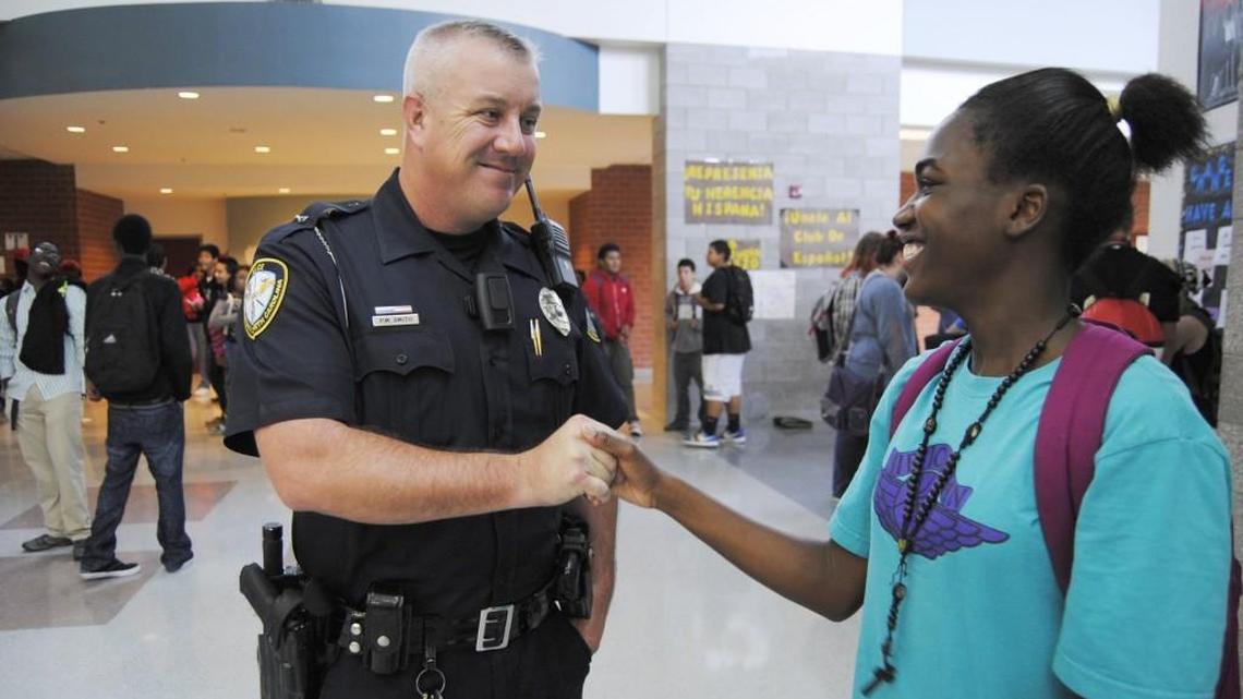Knightdale High School resource officer Pete Smith interacts with a student in this file photo.