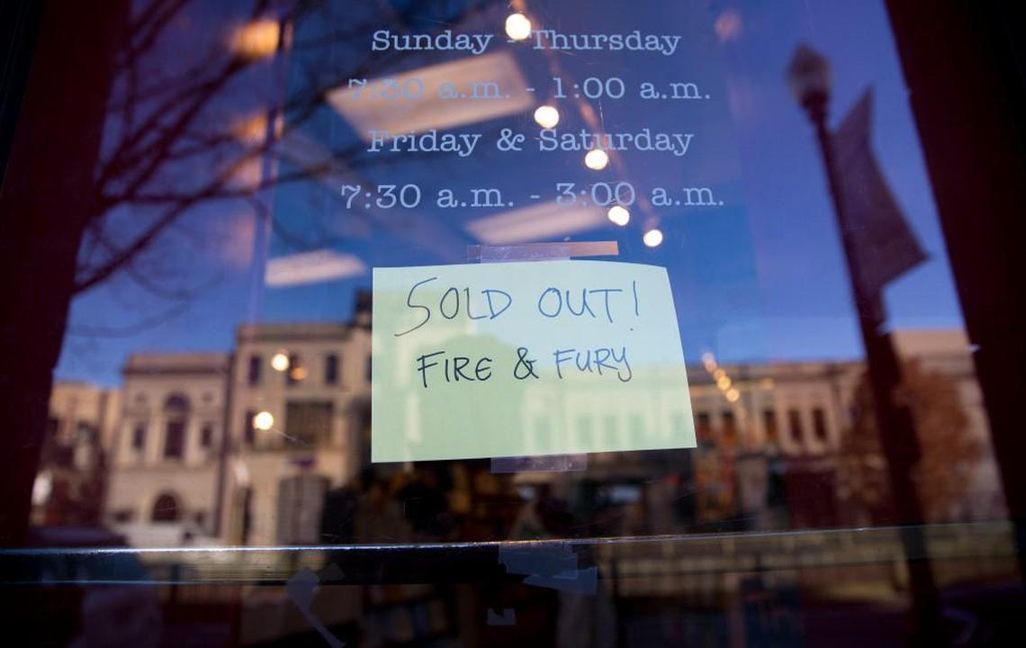 A sign posted ot the door for Kramerbooks & Afterwords Cafe in Washington, D.C., indicating that the book “Fire and Fury: Inside the Trump White House” is sold out at the bookstore Friday, Jan. 5, 2018.
