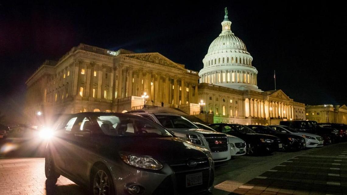 Parked cars surround the U.S. Capitol as the lights burn into the evening on the House of Representives side of the U.S., Capitol on Thursday night, March 23, 2017, in Washington, during a previous failed attempt by Republicans to pass a bill to replace Obamacare. A different version of the bill, called the AHCA, passed Thursday, May 4, 2017.