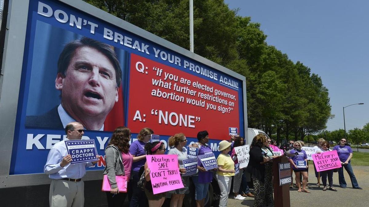 
Reia Chapman, with SisterSong, speaks at a news conference at Charlotte's Pearle Street Park, Monday, May 04, 2015. Planned Parenthood and NARAL, plus local medical professionals and concerned citizens, held the news conference to launch a statewide tour of a 20-foot billboard urging Gov. McCrory to veto any new abortion legislation.
