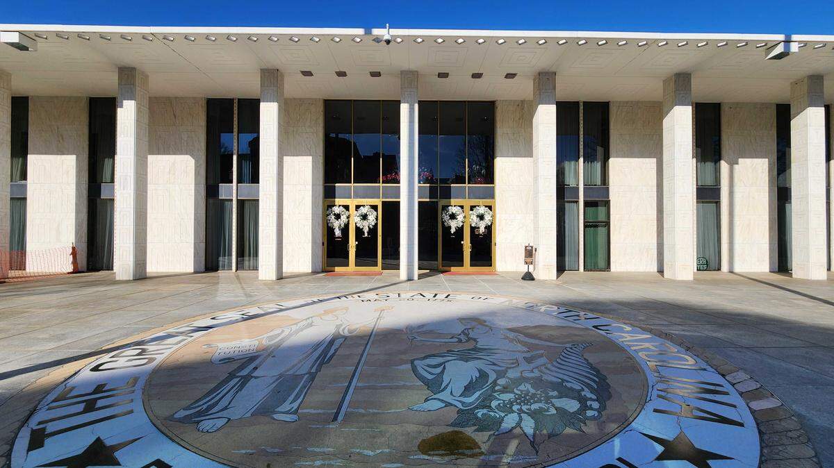 The North Carolina Legislative Building, with Christmas wreaths on the front doors, pictured in December 2025. No more voting sessions will be held this year, as legislative battles roll into 2026.