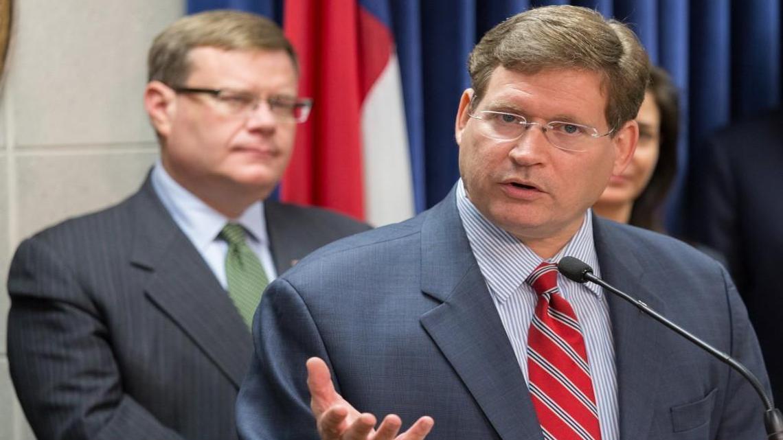 Rep. Nelson Dollar, R-Wake, discusses ongoing budget negotiations during a press conference at the N.C. General Assembly on Aug. 27, 2015 as House Speaker Tim Moore, R-Cleveland, looks on.