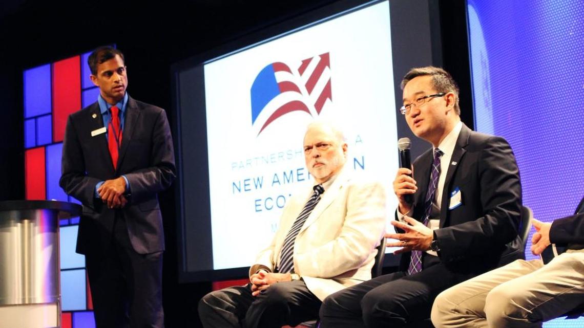 
Morrisville Town Council member Steve Rao, far left, moderates a panel discussion on immigration reform June 8, 2014.
