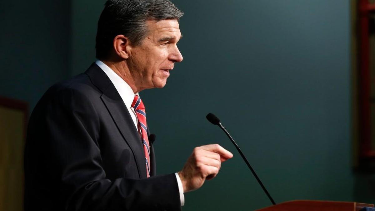 Roy Cooper speaks during a press conference at PNC Arena in Raleigh, N.C., on Wednesday, Dec. 21, 2016.