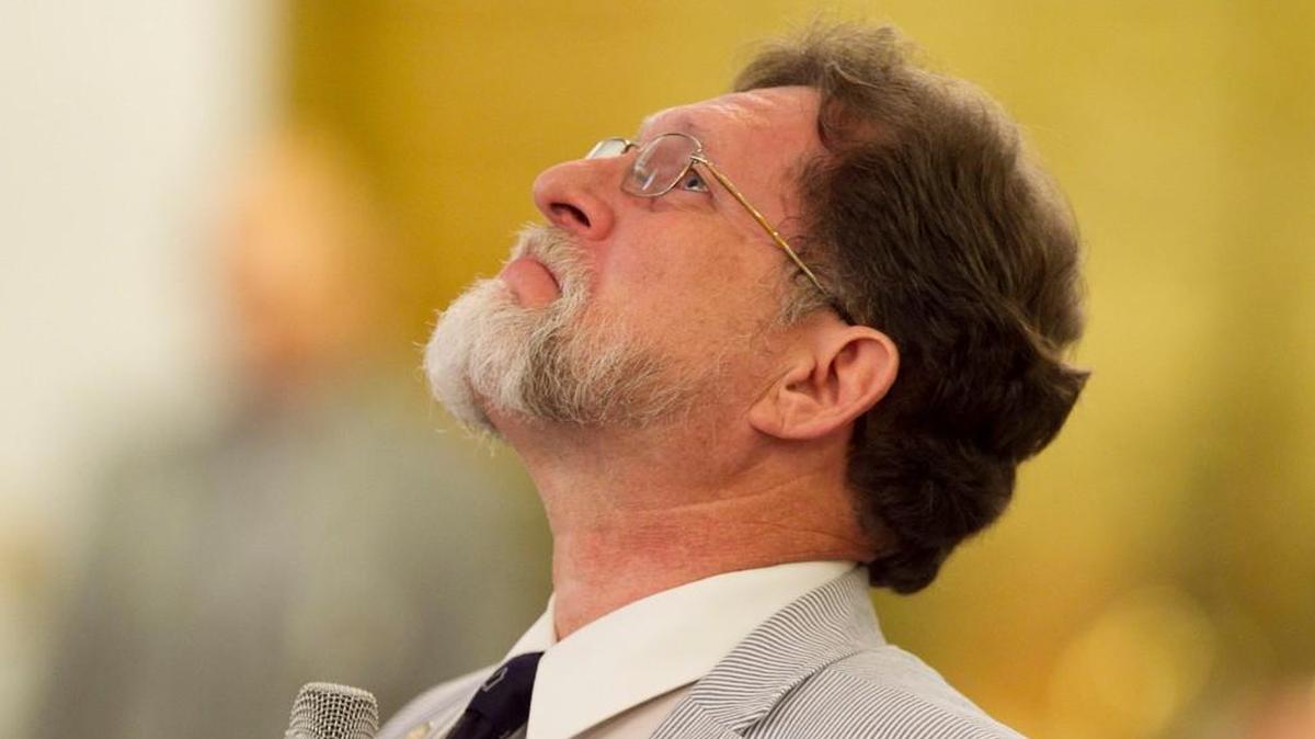 State Rep. Larry Pittman of Concord stares at the ceiling as he gathers himself in August 2014. In response to a school shooting in Florida on Feb. 14, 2018, Pittman on Feb. 15 encouraged a legislative committee to consider arming teachers in North Carolina.