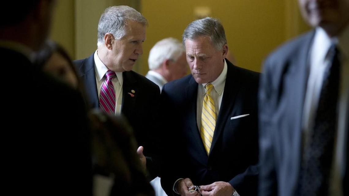 Sen. Thom Tillis, R-N.C., left, and Sen. Richard Burr, R-N.C., right, walk from a policy luncheon on Capitol Hill in Washington, Wednesday, July 8, 2015.