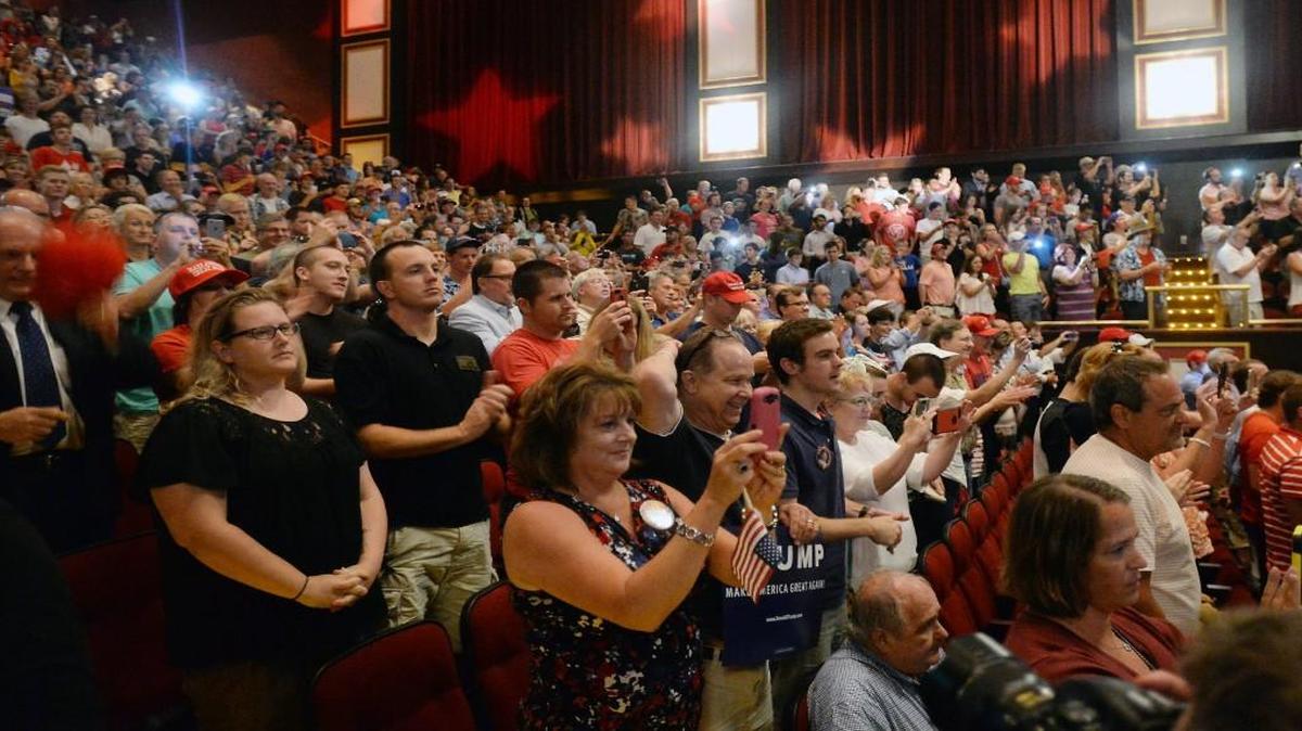 Supporters cheer as presumptive Republican presidential candidate Donald Trump as he takes the stage at the Duke Energy Center for the Performing Arts in Raleigh, N.C. Tuesday, July 5, 2016.