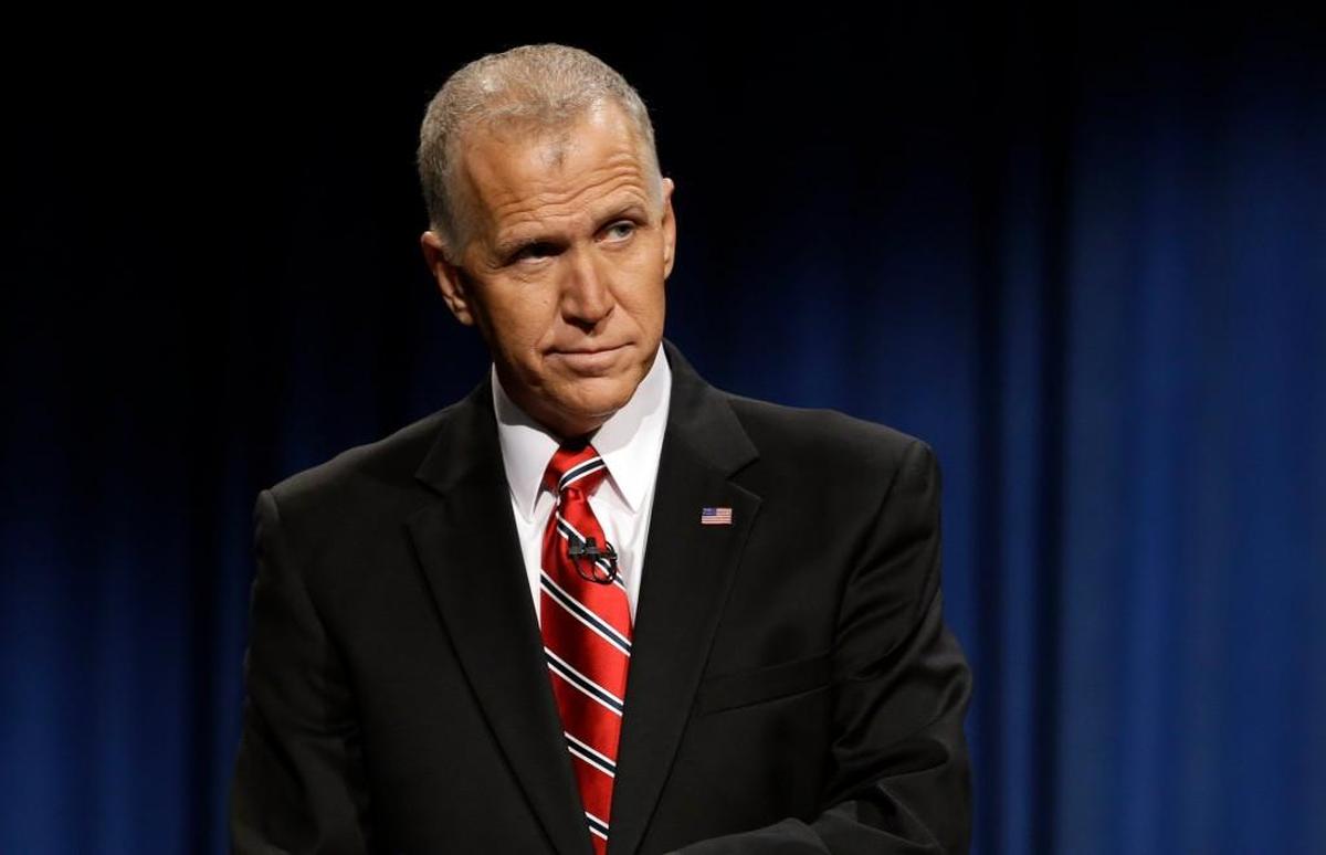 Thom Tillis, then a North Carolina Republican Senate candidate, debates then-Sen. Kay Hagan at UNC-TV studios in Research Triangle Park, N.C., on Oct. 7, 2014.
