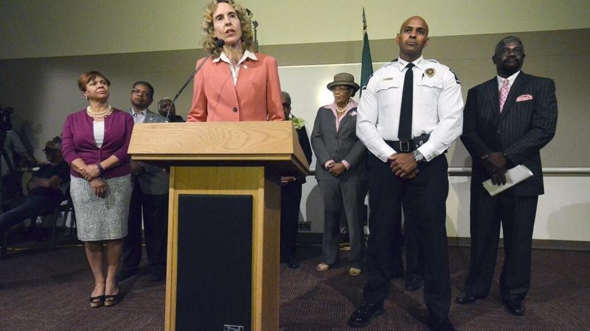 Mayor Jennifer Roberts and CMPD Chief Kerr Putney addressed questions about the transparency of the investigation of a fatal shooting by a CMPD officer. Charlotte's city leaders came together again for a press conference about the previous night's protests and the release or non-release of body cam video of a fatal shooting by a CMPD officer on Friday, Sept. 23, 2016.