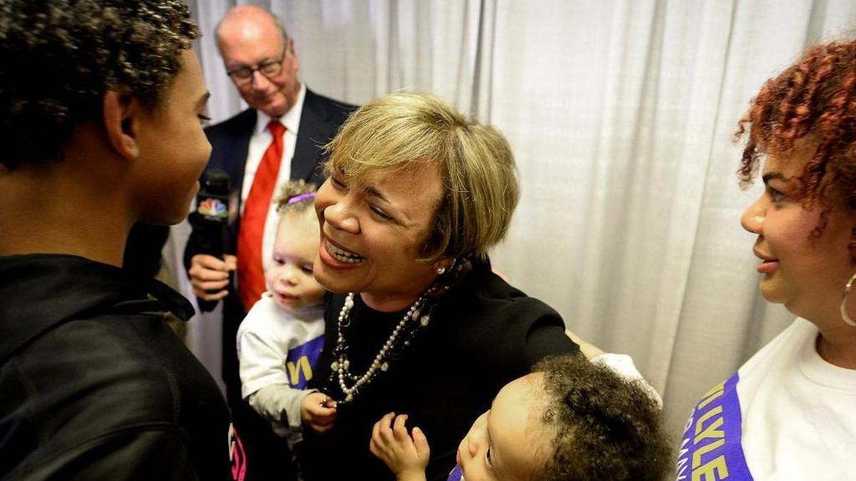 Charlotte Mayor Elect Vi Lyles, center, is congratulated by family and supporters on Tuesday after defeating Republican Kenny Smith. The victory for Lyles, a Democrat, makes her the first African American female to hold the office.