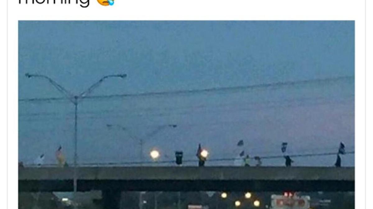 A frame grab of a tweet that went viral Wednesday, Nov. 9, 2016. But, law enforcement and a local newspaper reporter say there is no evidence that the demonstrators were connected to the KKK.