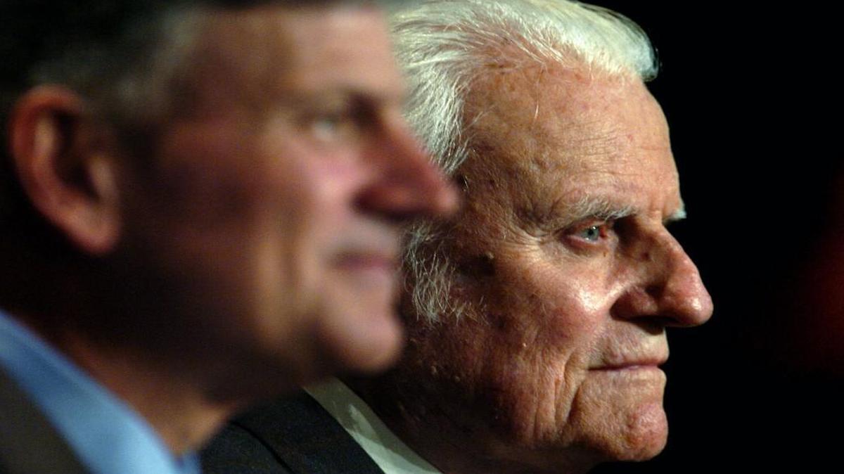 
With son Franklin Graham at his side, Charlotte native, Rev. Billy Graham, returns to his hometown to dedicate the new headquarters of the Billy Graham Evangelistic Association in this 2005 file photo.

