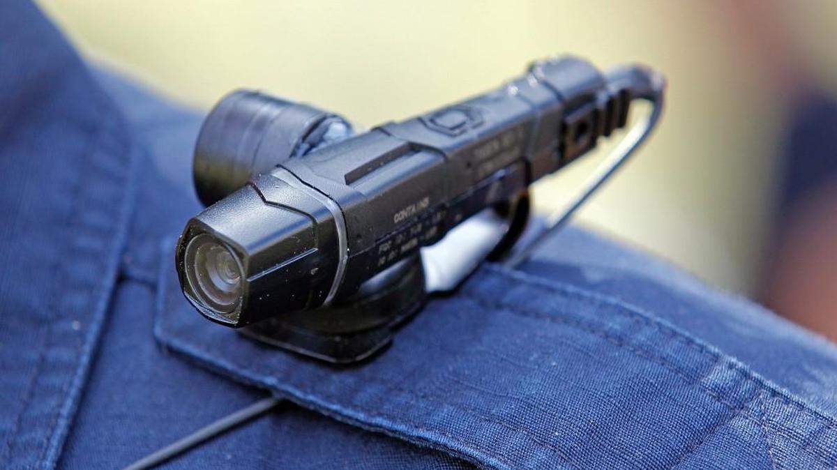 Garner police officer Kevin Murray tests a body camera as he wears one before starting his patrol in Garner on April 8, 2015. A bill currently being considered in the General Assembly would require all major NC law enforcement agencies to equip their officers with body-worn cameras.