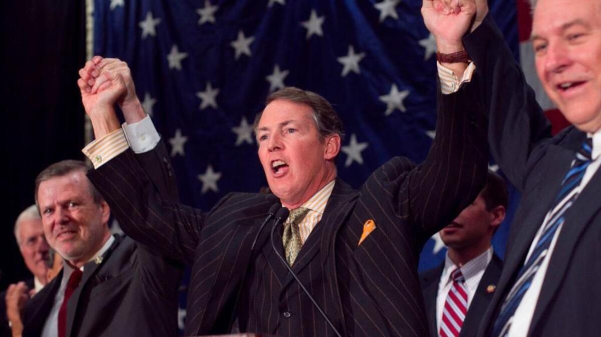 Then-N.C. Republican Party Chairman Tom Fetzer, center, is flanked by House Republican leader Paul “Skip” Stam, right, and Senate Republican leader Phil Berger at the Marriott in downtown Raleigh in 2010 as they celebrate the GOP’s newly acquired control of the General Assembly.