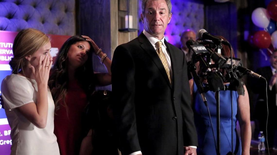 
Dr. Greg Brannon, candidate for U.S. Senate in the North Carolina Republican primary election, stands with family members while conceding the race to Thom Tillis, speaking to supporters at The Architect Bar and Social House in downtown Raleigh, N.C., Tuesday, May 6, 2014.
