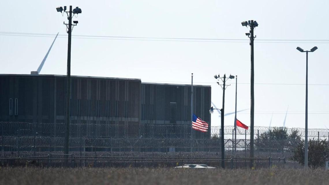 After an attack at Pasquotank Correctional Institution killed four employees, flags at the Elizabeth City prison were flown at half-staff. More than 28 percent of officer positions there were vacant.