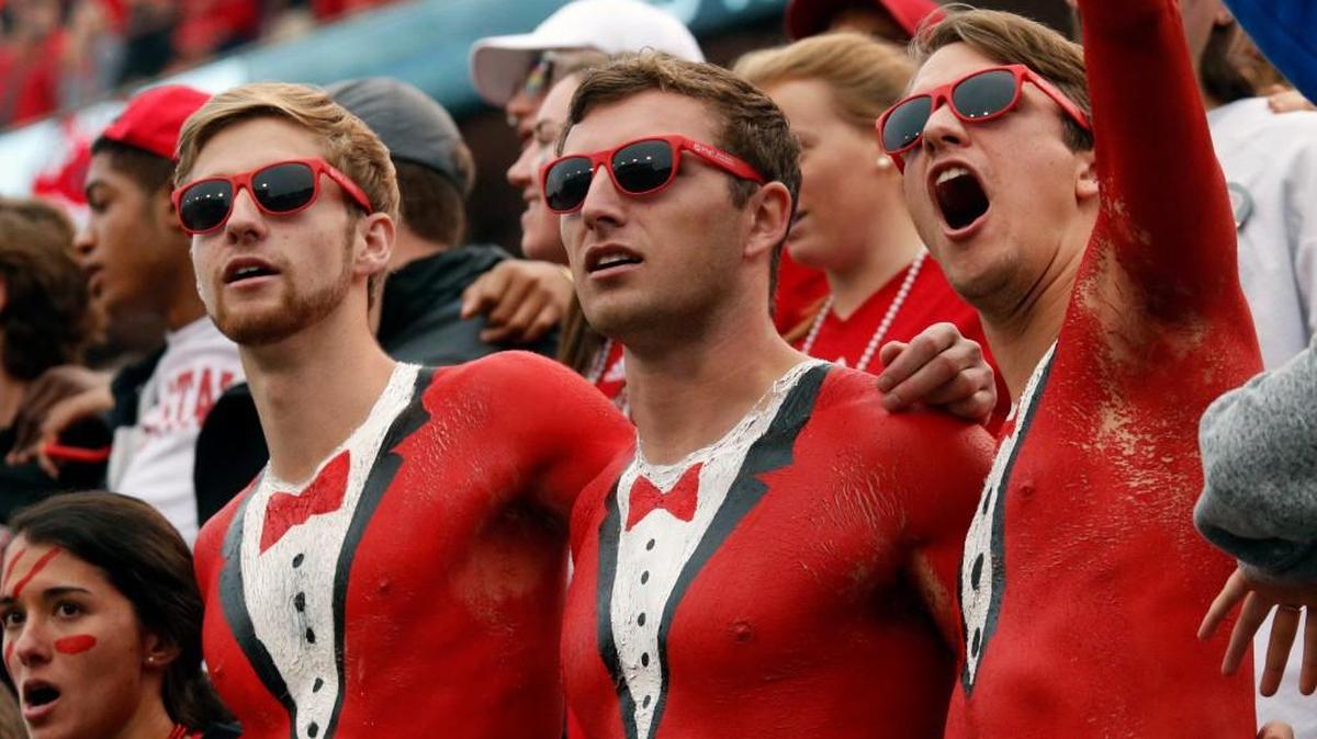 Wolfpack fans cheer on the team during an ACC college football game between the N.C. State Wolfpack and the Clemson Tigers played at Carter-Finley Stadium in Raleigh, NC, on Nov. 4, 2017.