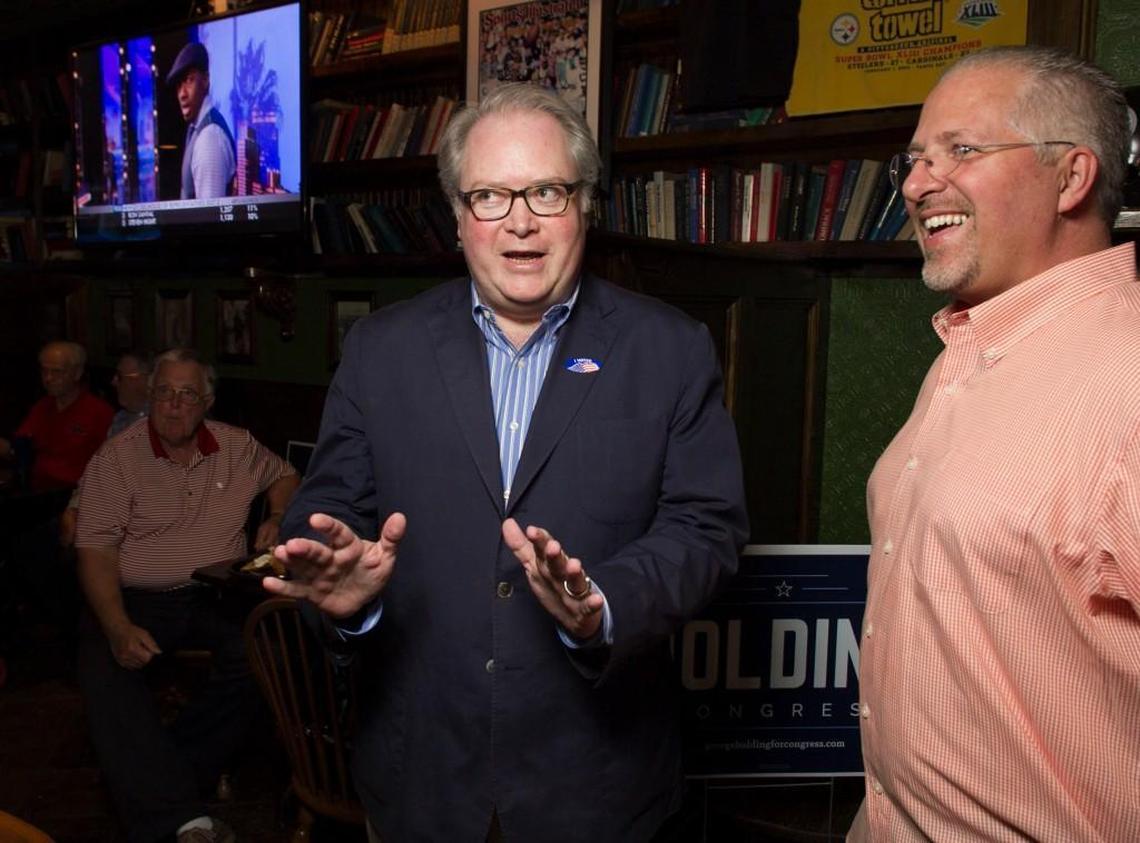 U.S. Rep. George Holding talks with Duane Cutlip on June 7, 2016 at the Hibernian in Raleigh, N.C.
