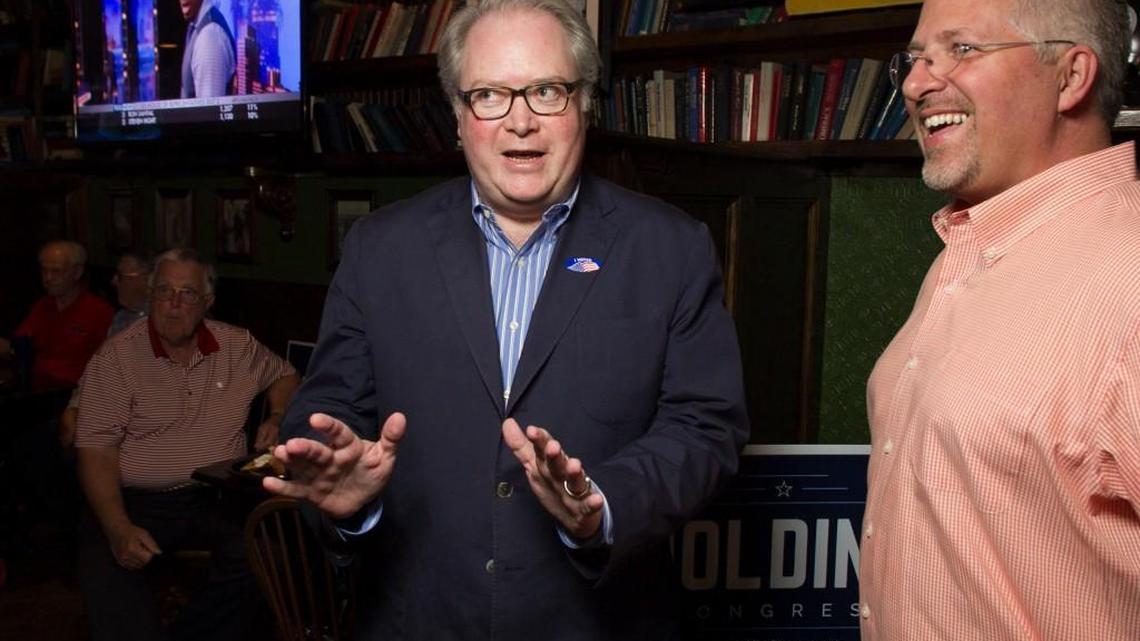 U.S. Rep. George Holding talks with Duane Cutlip on June 7, 2016 at the Hibernian in Raleigh, N.C.