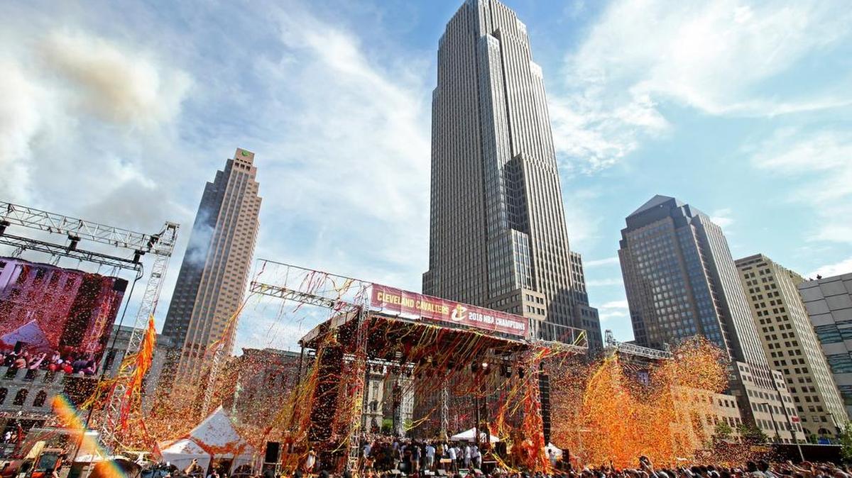 View of the Cleveland skyline as the Cleveland Cavaliers hoist the Larry O'Brien Trophy during the Cleveland Cavaliers 2016 NBA Championship victory parade and rally in June.