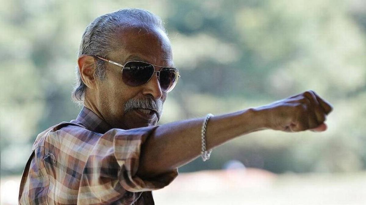 North Carolina Rep. H.M. "Mickey" Michaux Jr. is pictured in 2017 telling stories about Louis E. Austin, founder of the Carolina Times newspaper.