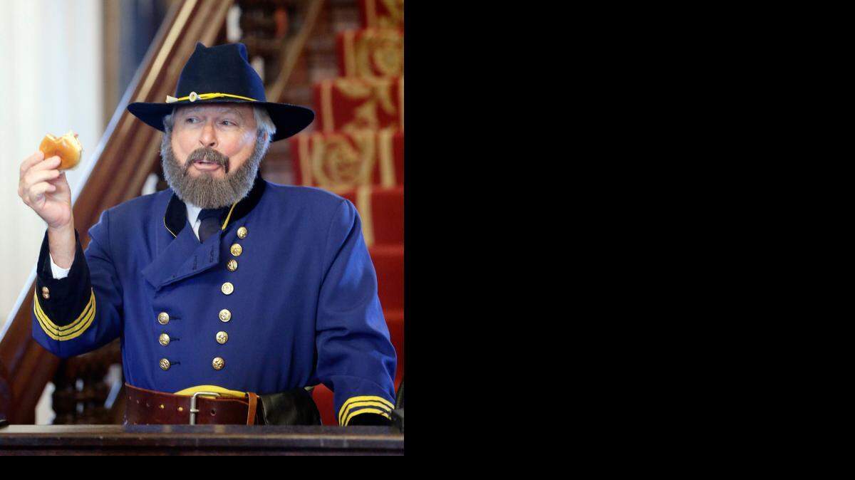 
Actor Ira David Wood III cites North Carolina barbecue as the reason he didn’t burn Raleigh to the ground as he portrays Union General William Tecumseh Sherman at an event at the Governor’s Mansion on Monday commemorating the 150th anniversary of the surrender of the city.
