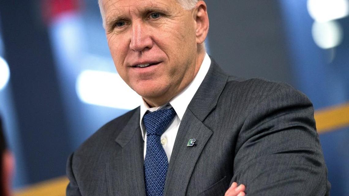 Sen. Thom Tillis speaks with an aide after a vote at the U.S. Capitol, May 9, 2016, in Washington, DC.