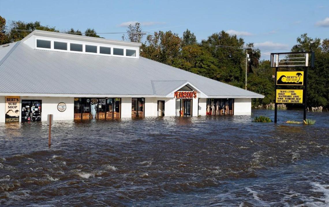 Food waters cover signs and buildings on U.S. Hwy. 70 in Kinston, NC on Oct. 14, 2016.