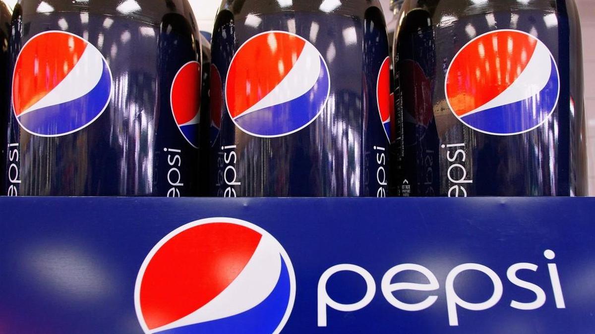 This file photo shows bottles of Pepsi at a grocery store in Springfield, Ill.