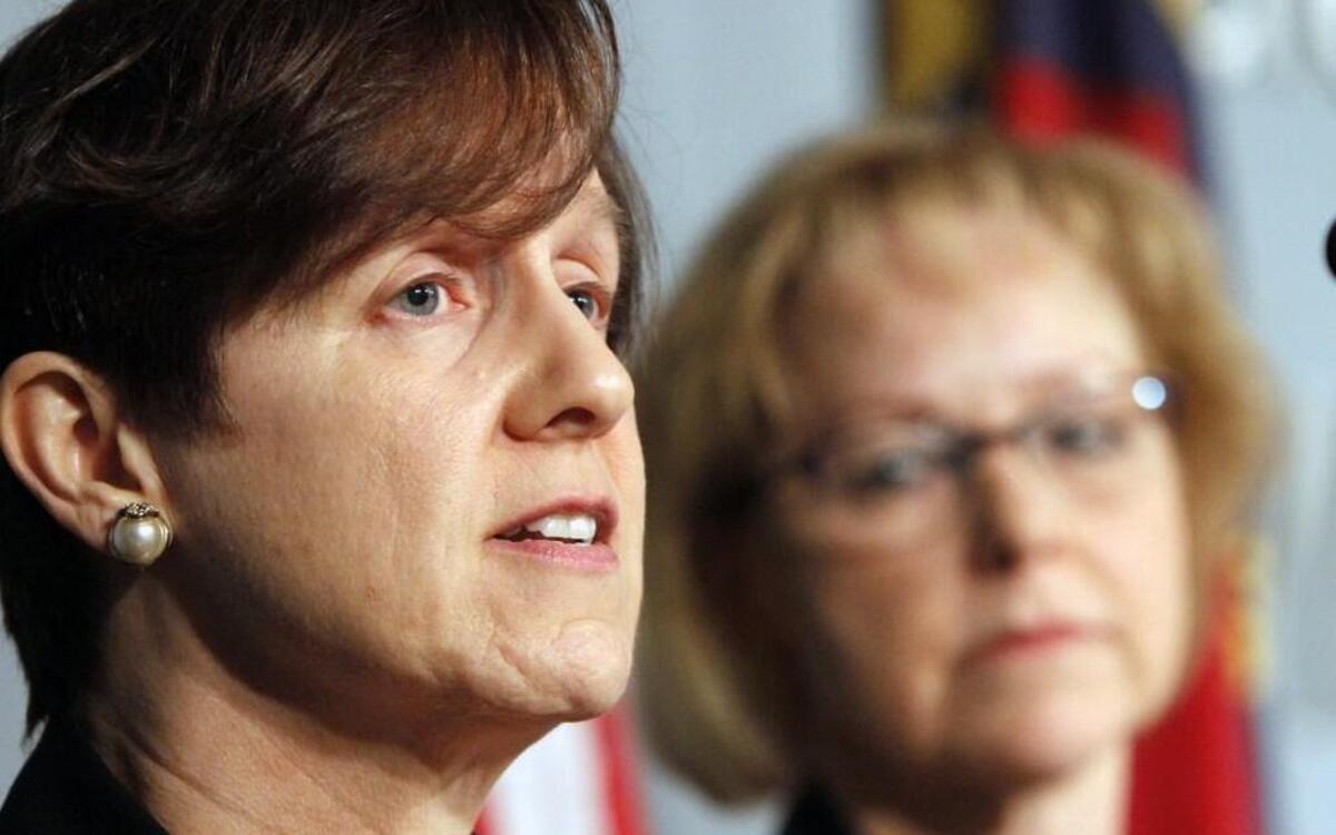 Megan Davies, left, an epidemiologist and section chief in the state Division of Public Health, submitted a scathing letter of resignation in response to an open letter distributed to the news media on Tuesday by her boss, state health director Dr. Randall Williams, and Tom Reeder, an assistant secretary in the state Department of Environmental Quality.