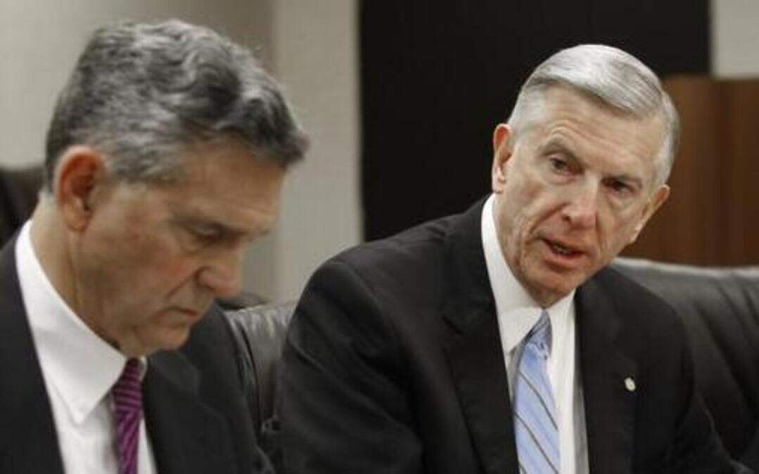 
UNC System president Tom Ross, right, sits with UNC Board of Governors chair John Fennebresque, left, during a a press conference Friday, January 16, 2015. Ross was forced out of his job at system president by the Board and will work to January 3, 2016 or until his successor is chosen.
