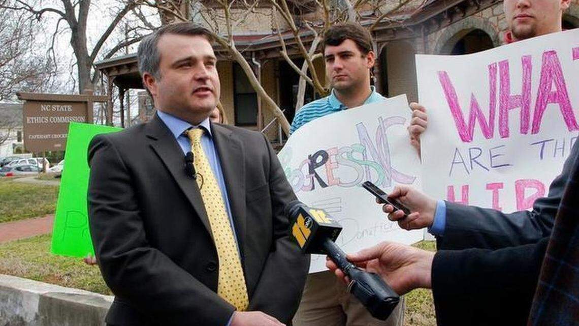Todd Poole, left, with the NC GOP, questions the motives of Progress NC Action, which filed a complaint against Gov. Pat McCrory in this March 2015 file photo. The complaint alleges that McCrory did not properly report travel as required by law.