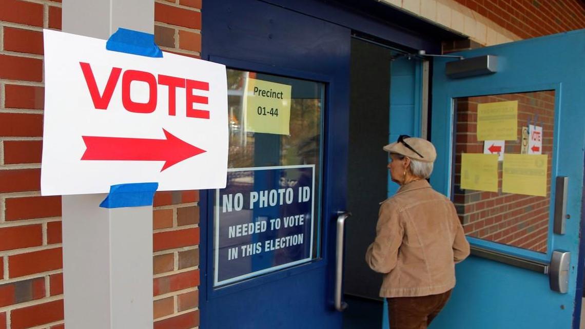 
A voter goes to cast her ballot at Millbrook Elementary in Raleigh in November 2014. The state House voted to add party affiliations to the ballot in N.C. Court of Appeals races.
