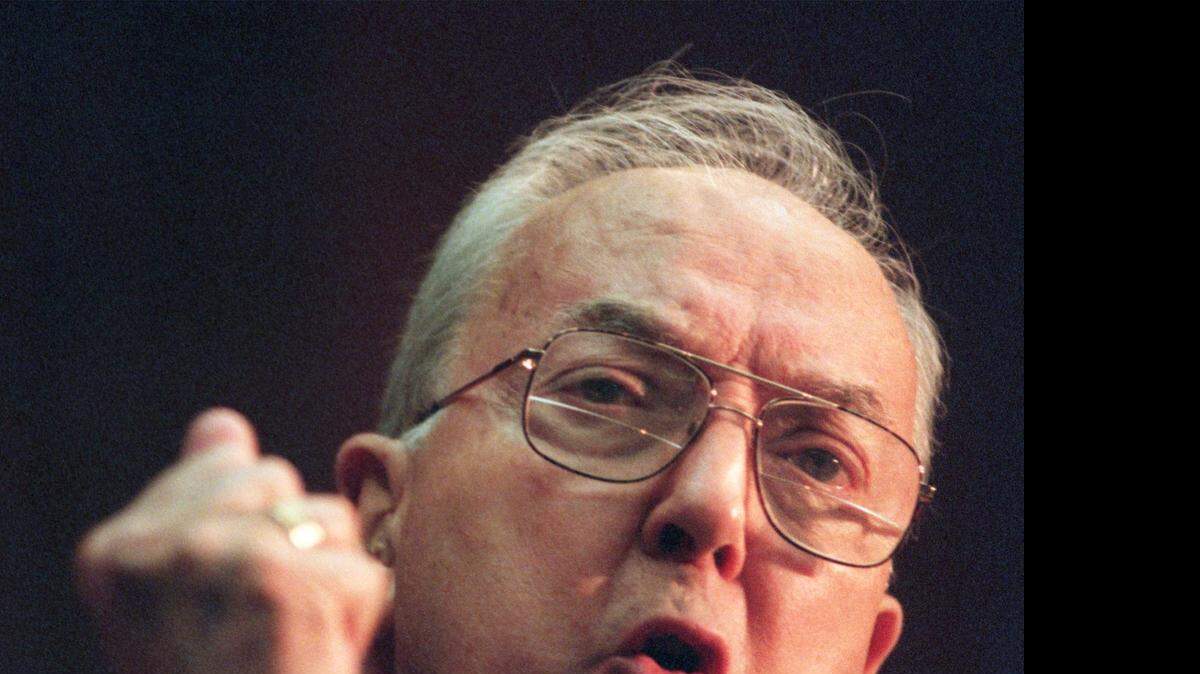 
Jesse Helms, shown in 1997, opposed the federal Religious Freedom Restoration Act more than two decades ago.
