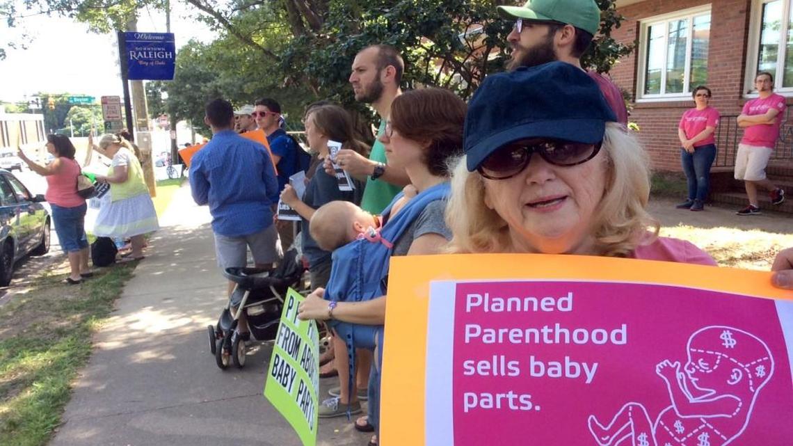 
Veronica Mullaney, 74, protests outside Planned Parenthood Saturday August 22, 2015, in Raleigh, N.C. The N.C. House approved a bill Monday that would ban state funding from going to the organization and other abortion providers.
