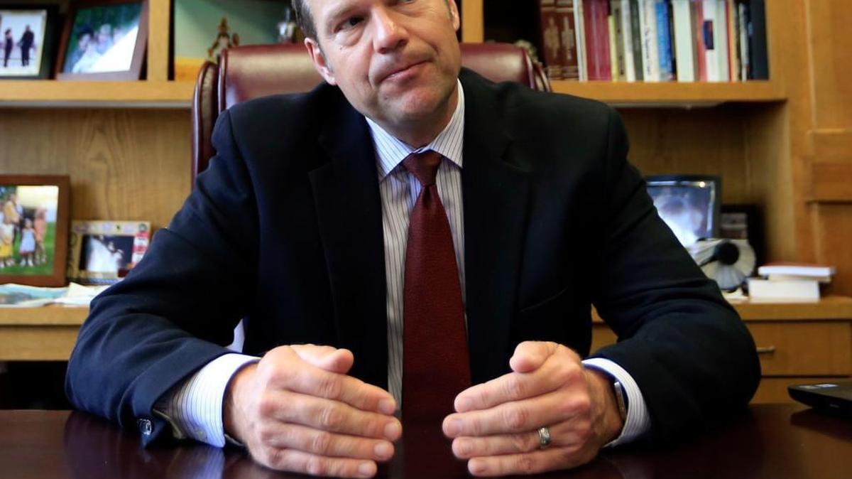 In this May 17, 2017, file photo, Kansas Secretary of State Kris Kobach talks with a reporter in his office in Topeka, Kan. Kobach is the vice chair of President Donald Trump's election fraud commission.