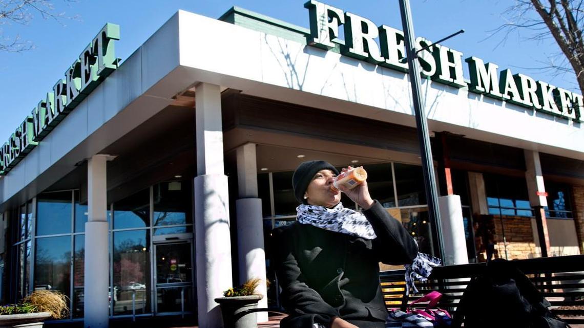 Cindy Williams, of Raleigh, finishes her breakfast after shopping at the Fresh Market in Cameron Village. The grocer has joined a Human Rights Campaign petition opposing House Bill 2.