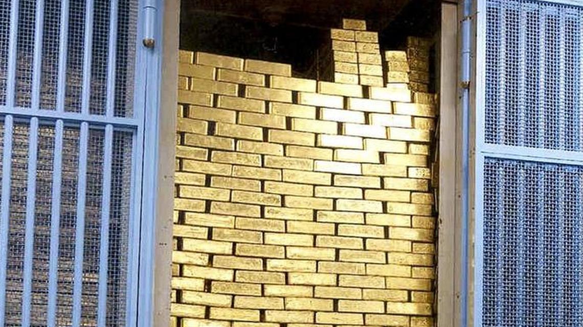 A handout photo of gold bars stacked in a vault underneath the Federal Reserve Bank of New York.