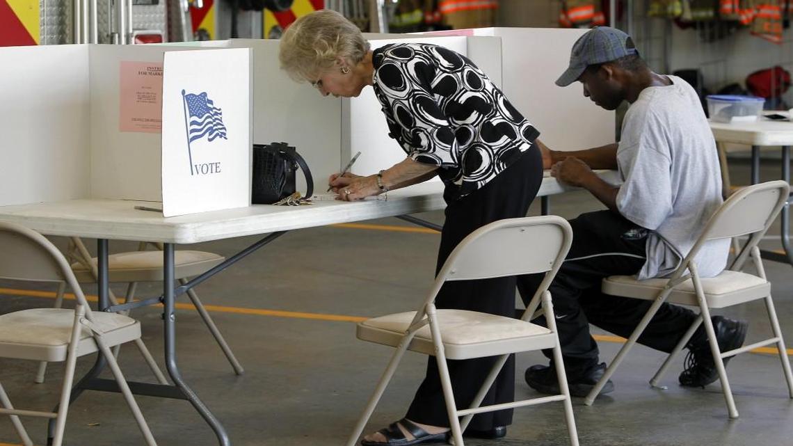 Voters cast their ballots at Clayton Fire Station, Johnston Co. Precinct 10A, on West Horne St. in downtown Clayton NC in this 2014 file photo.