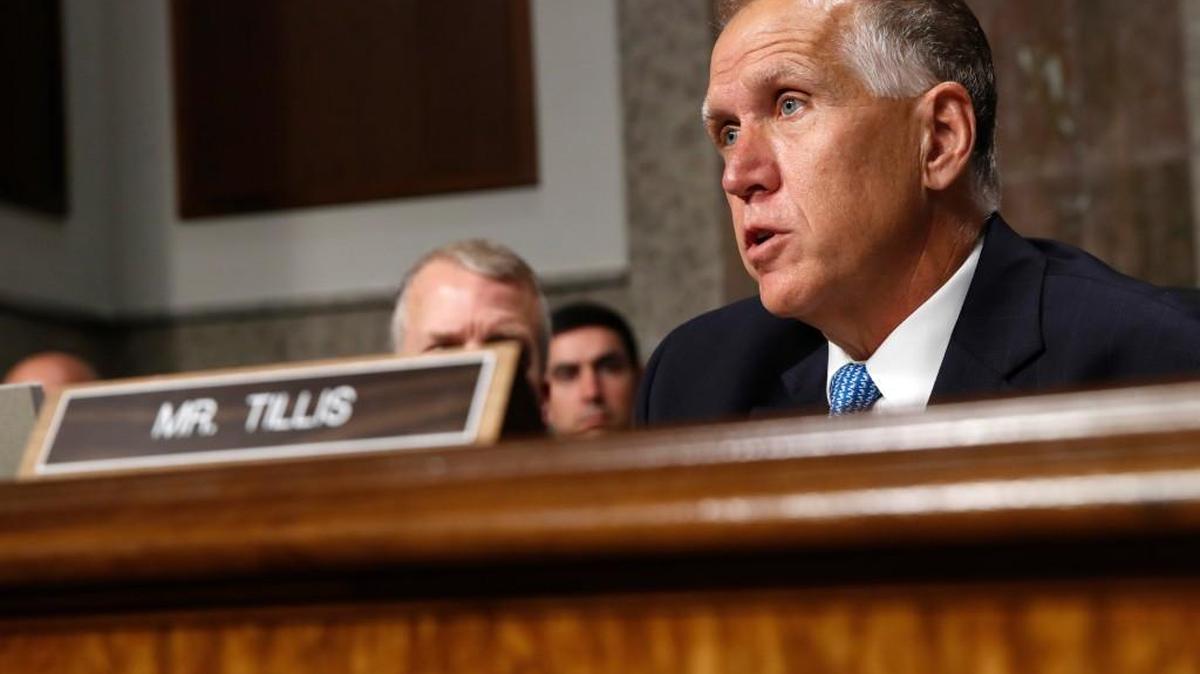 Senate Armed Services Committee member Thom Tillis of North Carolina questions Navy Secretary nominee Richard Spencer on Capitol Hill in Washington, July 11, 2017, during Spencer's confirmation hearing before the committee.