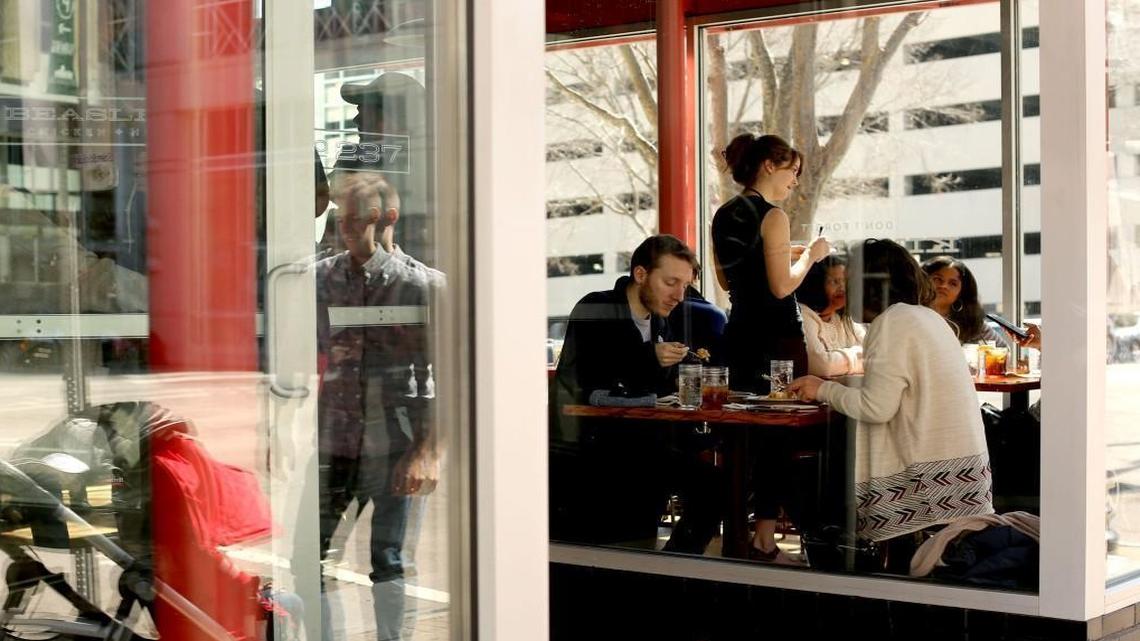 Guests eat brunch at Beasley's Chicken + Honey in downtown Raleigh last month.