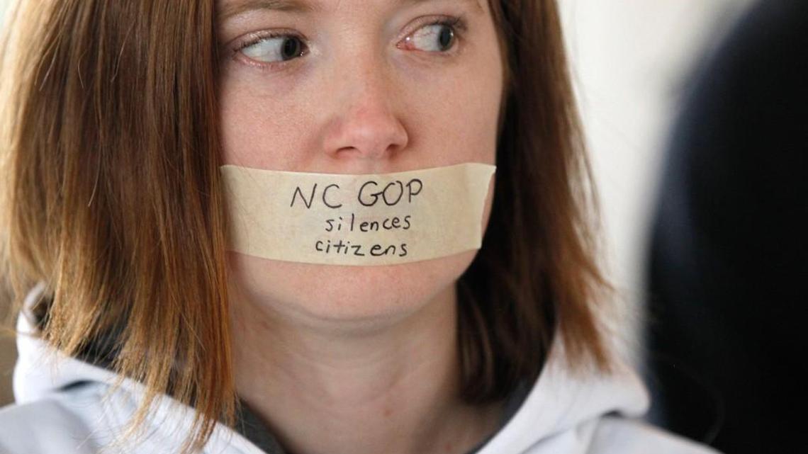 Rachel Jordan of Cary protests outside the House gallery during a special session of the N.C. General Assembly at the Legislative Building in Raleigh, N.C., Friday, Dec. 16, 2016. Common Cause and 10 NC residents have filed a lawsuit accusing Lt. Gov. Dan Forest and NC legislative leaders Phil Berger and Tim Moore of violating the state Constitution. A judge refused to dismiss the lawsuit on Tuesday, July 18, 2017.