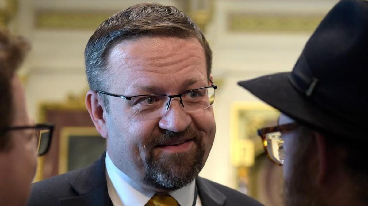 In this May 2 file photo, deputy assistant to President Trump, Sebastian Gorka, talks with people in the Treaty Room in the Eisenhower Executive Office Building on the White House complex in Washington during a ceremony commemorating Israeli Independence Day. Gorka is scheduled to speak at UNC on Nov. 13, according to the UNC College Republicans.