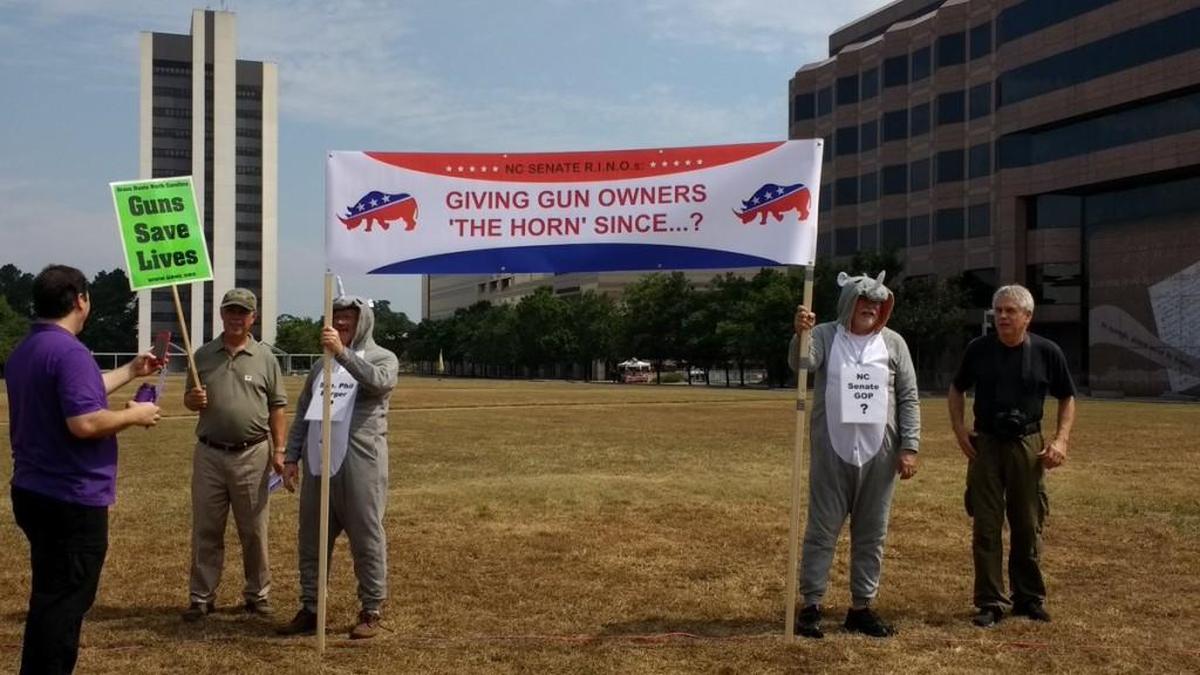 Grass Roots North Carolina holds a rally outside the NC General Assembly on Thursday, Aug. 3, 2017, calling on N.C. Senate Republicans to pass legislation loosening gun permit requirements.