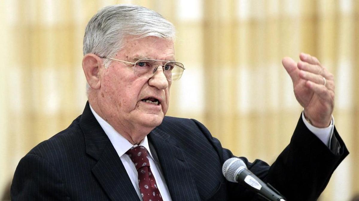 Former Governor Jim Martin gives his report on UNC athletics at a UNC-Chapel Hill Board of Trustees meeting held at the Carolina Inn in Chapel Hill on Dec. 20, 2012.