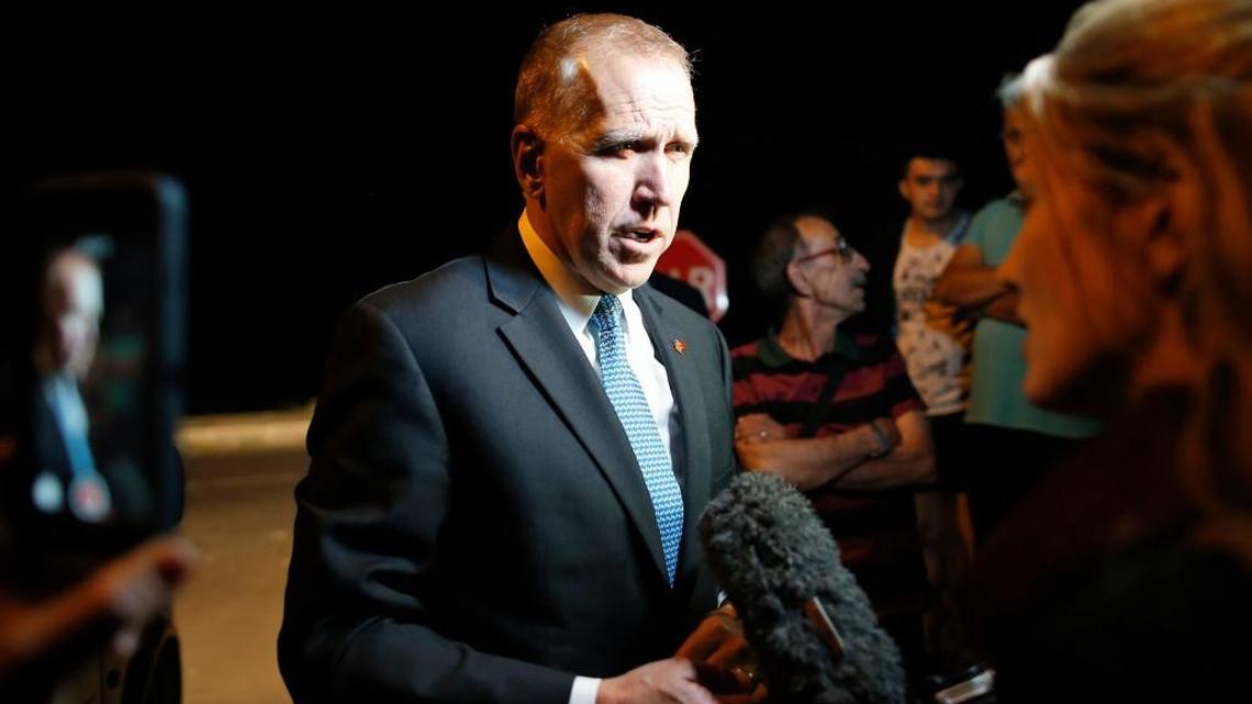 U.S. Sen. Thom Tillis of North Carolina talks to the media outside the court in Aliaga, Izmir province, western Turkey, Monday, April 16, 2018, where the trial of jailed Andrew Brunson, who served as the pastor in Izmir, Turkey, was held. Brunson, 50, a pastor from North Carolina, was arrested in December 2016 for alleged links to both an outlawed Kurdish insurgent group and the network of the U.S.-based Muslim cleric who Turkey blames for masterminding a failed military coup that year. The court adjourned trial until May 7, 2018 and ruled that Brunson remain in custody until then.