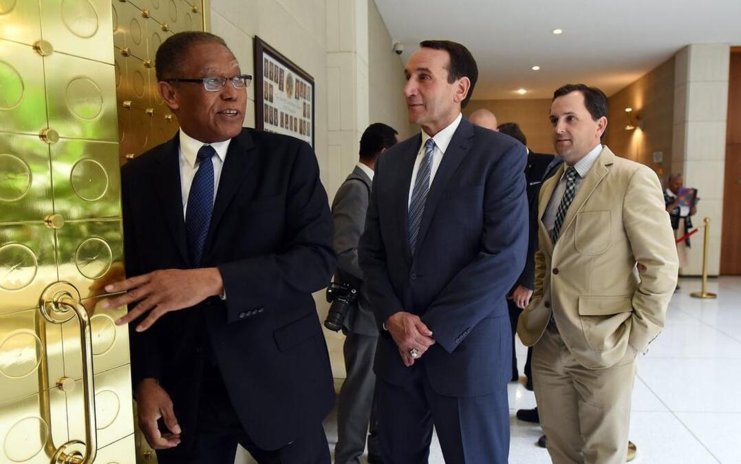 
Senator Dan Blue, left, leads Duke head coach Mike Krzyzewski and Rep. Rob Bryan, right, into the Senate chamber as the House and Senate held a special joint session of the General Assembly Tuesday. Krzyzewski and the 2015 National Champion team were honored as a unanimous resolution was passed by both chambers honoring the Blue Devils for their fifth National Championship.
